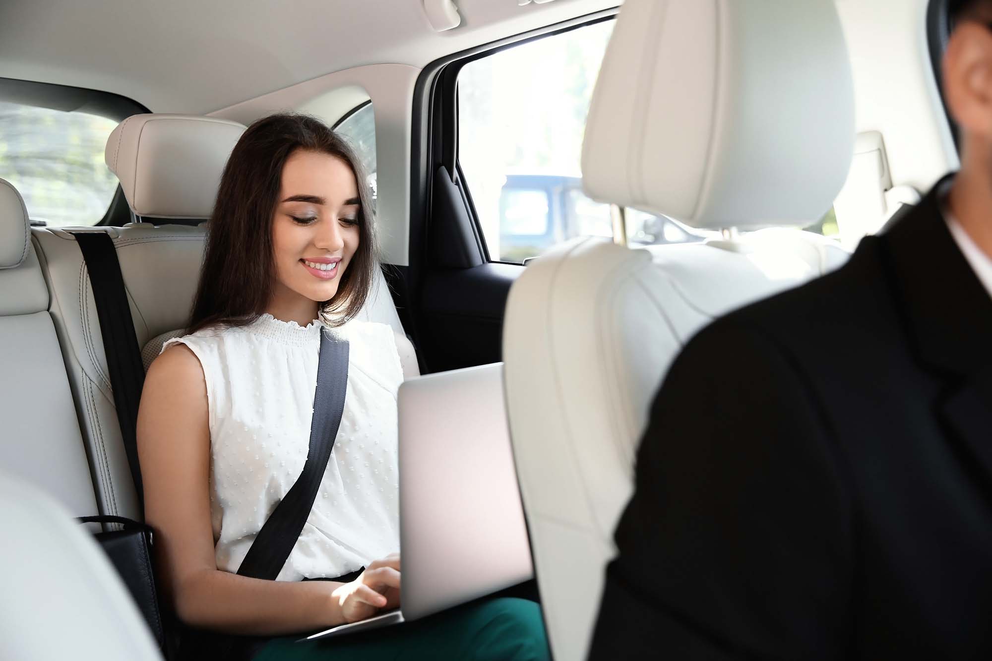 Businesswoman in taxi